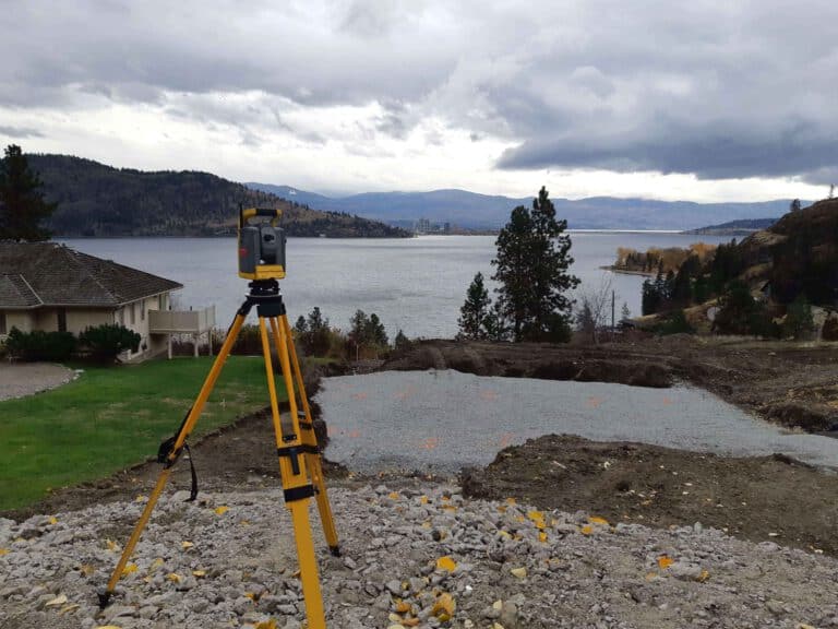 Surveying by the lake